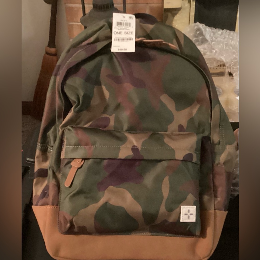 RILEY Camouflage Backpack with Tan Accents.